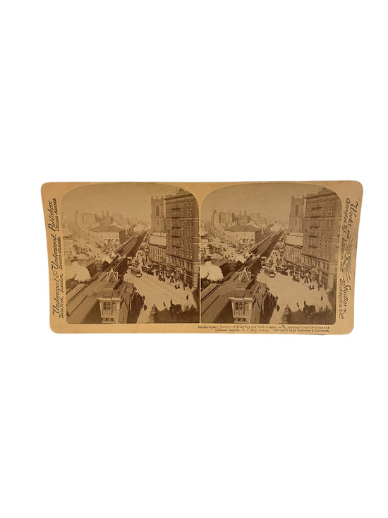 Stereoscope Card- Herald Square, Junction of Broadway and Sixth Avenue, North, Showing Herald Building and Elevated Railway, N.Y. City, U.S.A.